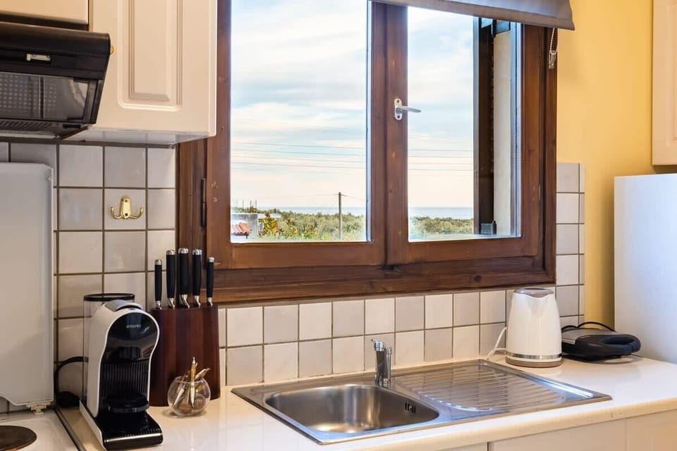 Panoramic View from the Kitchen Window – Scenic outdoor views while preparing meals.