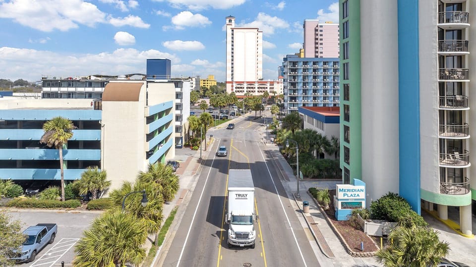 We have a parking deck right across the street from the condo building.  You will receive 1 pass for your stay.  