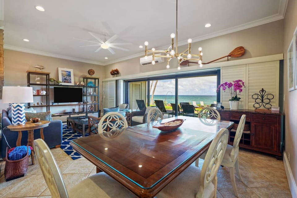 Spacious great room offering integrated dining and coastal views.