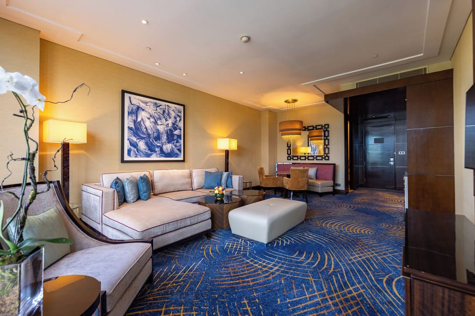 Premier Suite | Living area | 45-inch TV with cable channels, MP3 dock