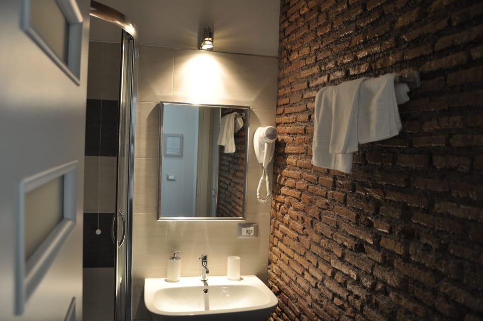 Suite, Hot Tub | Bathroom | Shower, hair dryer, bidet, towels