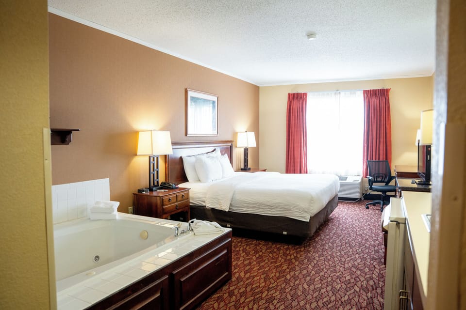 Honeymoon Suite | Pillowtop beds, desk, iron/ironing board, cribs (free)