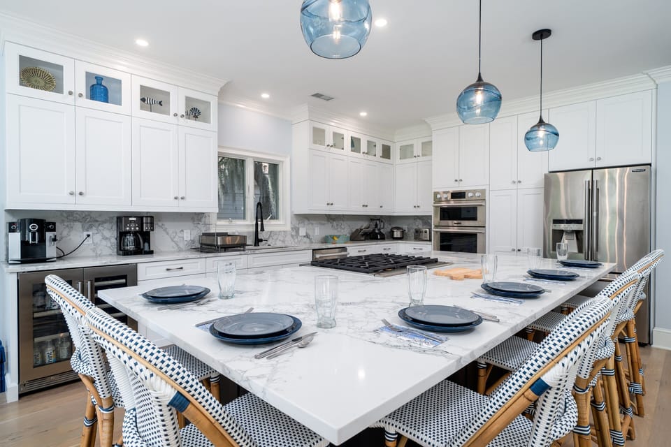 Spacious gourmet kitchen with oversized island with seating for 6