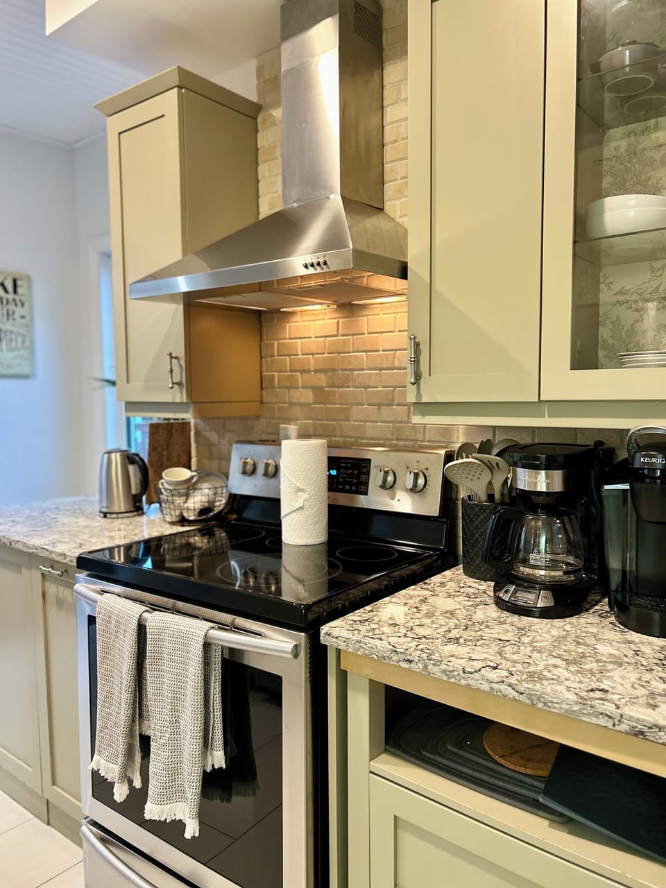Fully equipped kitchen with modern appliances and everything needed to cook.