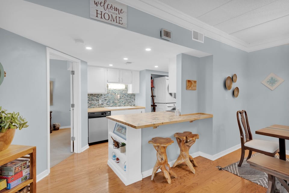 Kitchen and extra seating featuring 2 barstools
