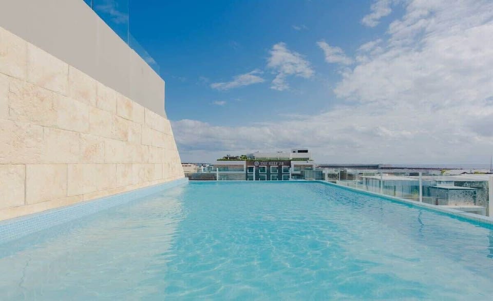 Rooftop shared pool with a view