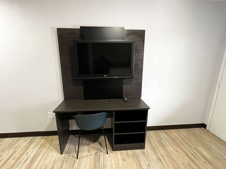 Desk, blackout drapes, WiFi (free), bed sheets