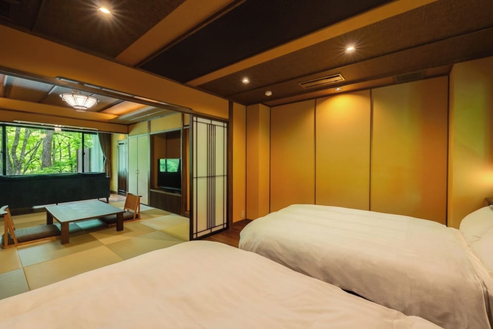 Quadruple Room | Down comforters, in-room safe, blackout drapes, WiFi (free)