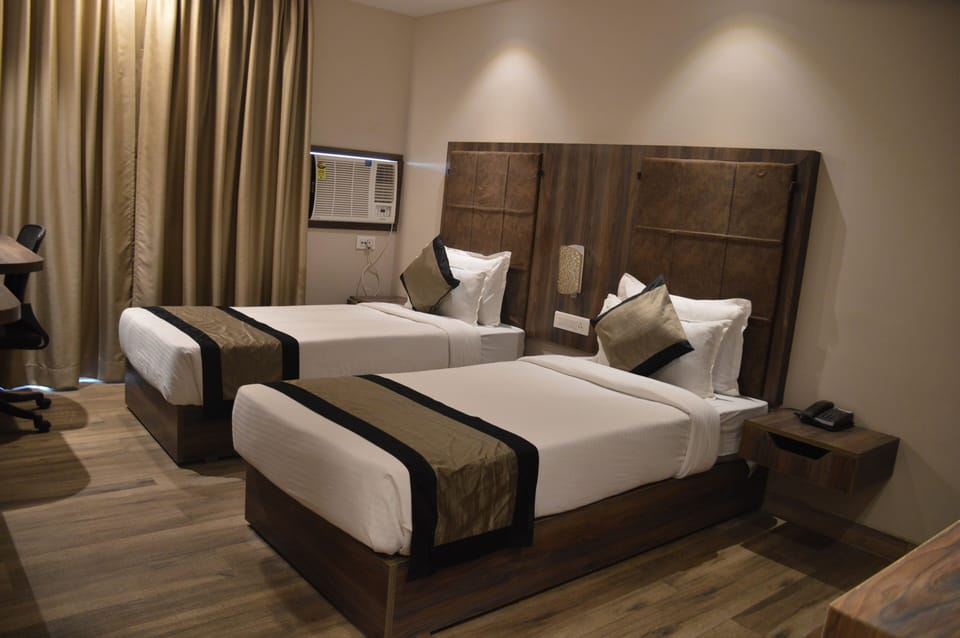 Premium Double or Twin Room | Individually furnished, desk, laptop workspace, blackout drapes