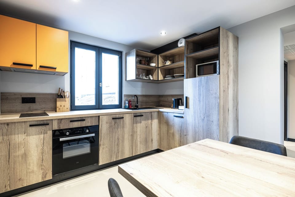 Standard Apartment, 2 Bedrooms | Private kitchen | Highchair