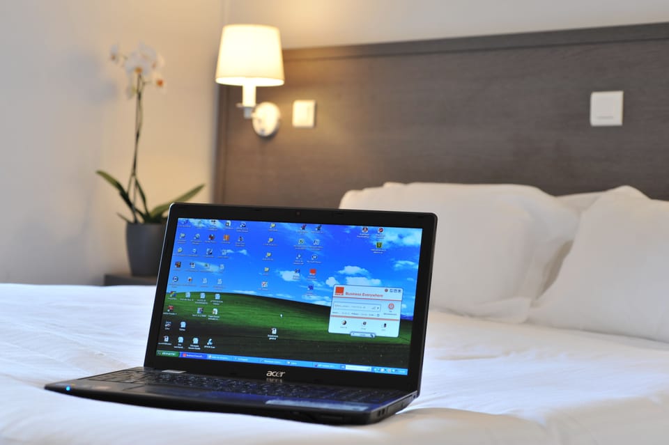 Premium bedding, desk, blackout drapes, soundproofing