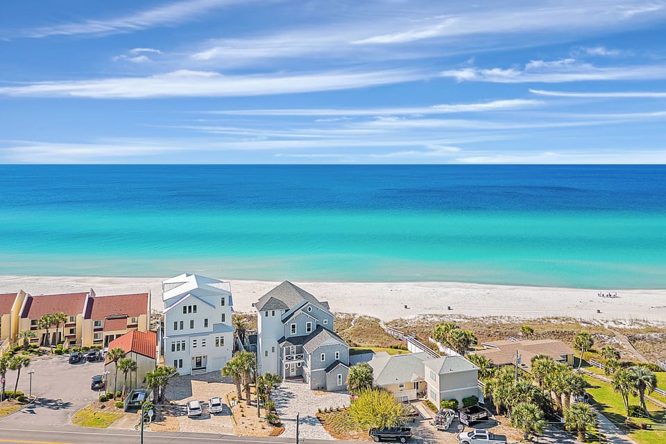 Beachfront property showcasing stunning turquoise waters.