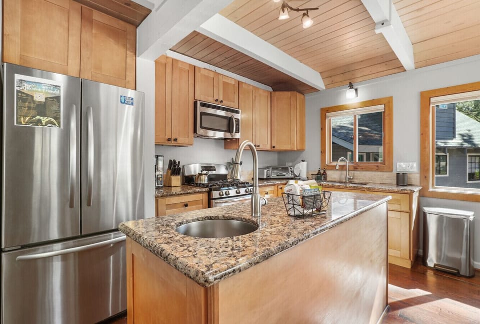 Well stocked kitchen with stainless steel appliances