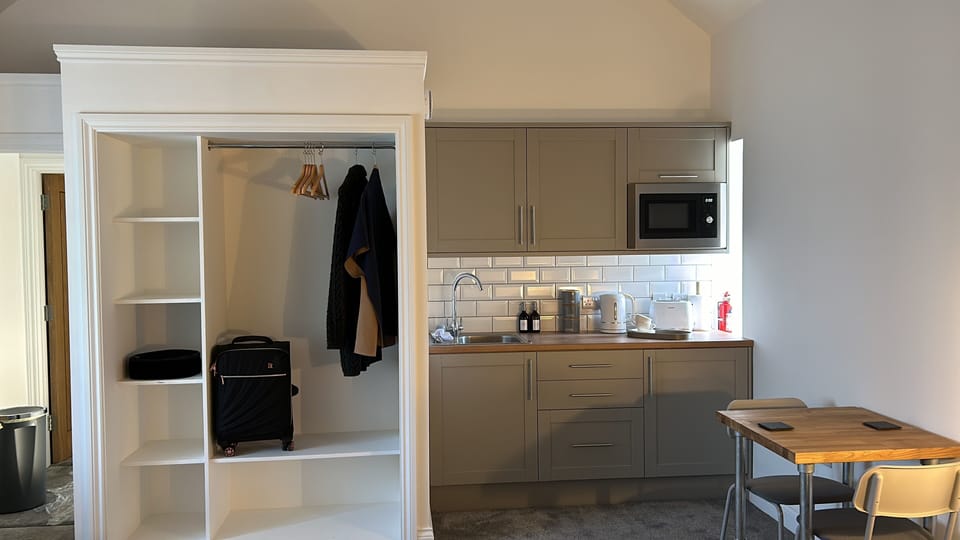 Luxury Studio Suite | Premium bedding, down comforters, minibar, individually decorated
