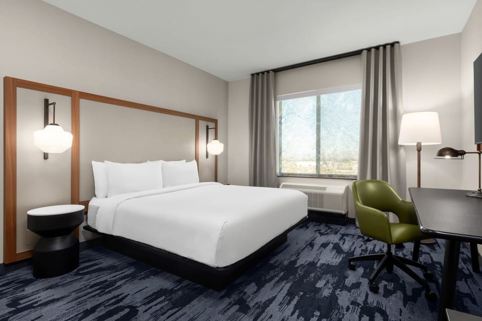 Premium bedding, pillowtop beds, desk, laptop workspace