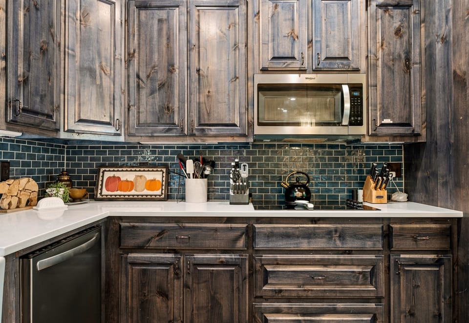 The large kitchen island provides plenty of space for cooking or gathering around with friends and family.
