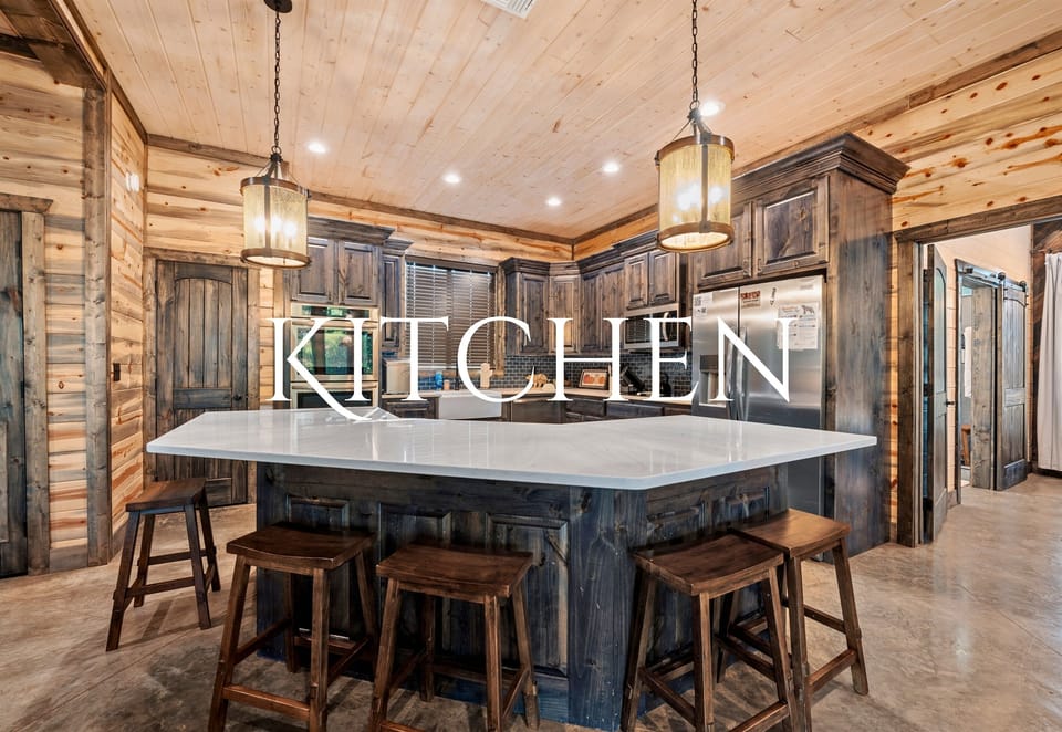 This stylish kitchen features everything you need to whip up a delicious meal, with modern appliances and plenty of prep space.