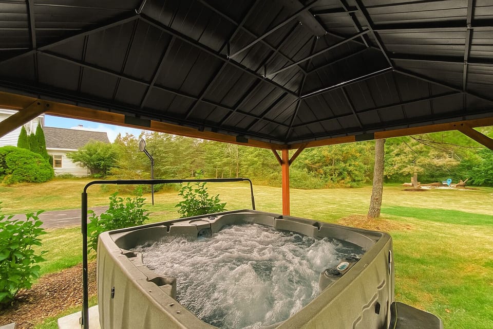 Escape to our serene retreat and soak away your cares in our inviting hot tub.