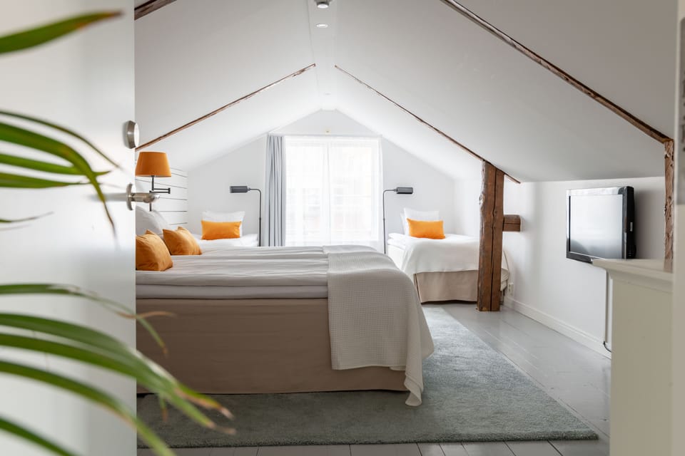 Family Quadruple Room, 1 Bedroom | Individually decorated, individually furnished, free WiFi, bed sheets