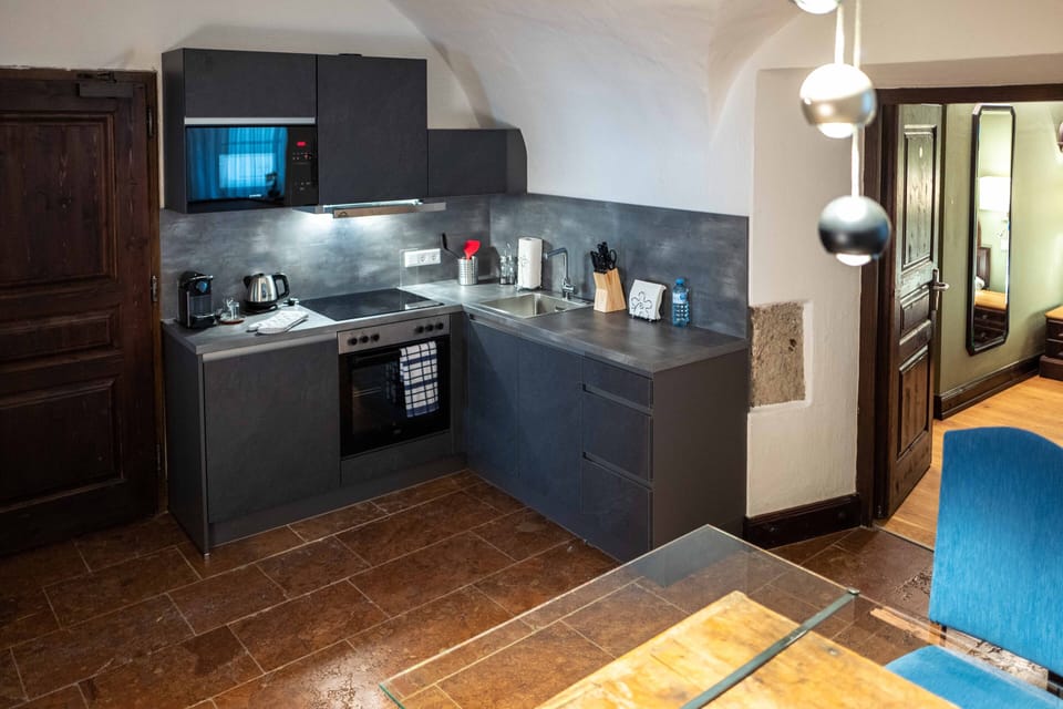 Deluxe Apartment (2 guests=40m2, 3-4 guests=65m2) | Private kitchen | Mini-fridge, dishwasher, coffee/tea maker, cookware/dishes/utensils