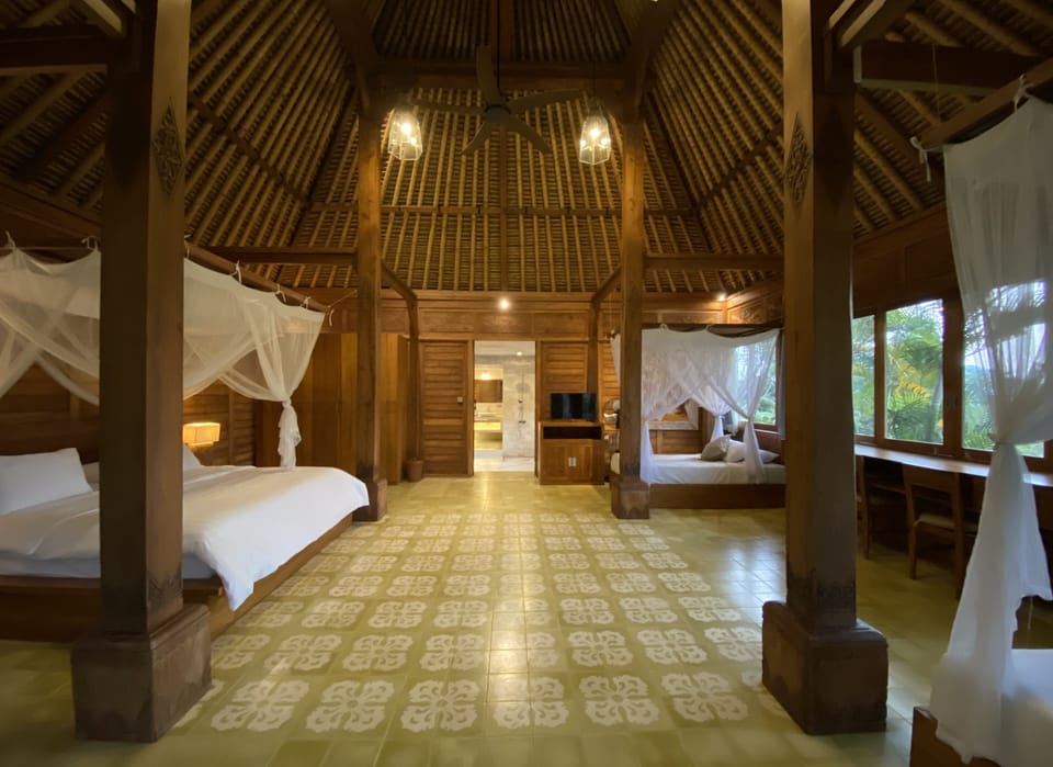 Family Room (Private Bungalow) | Minibar, in-room safe, desk, bed sheets