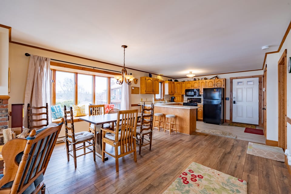 Open living space with the kitchen and dining area.
