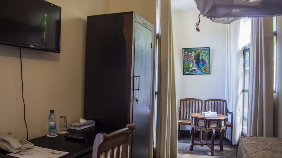 Standard Room | Living area | Flat-screen TV, fireplace