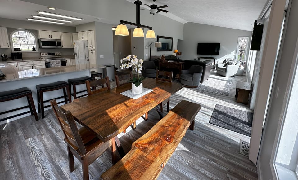 Open floor plan with lots of light. Picture windows face east.