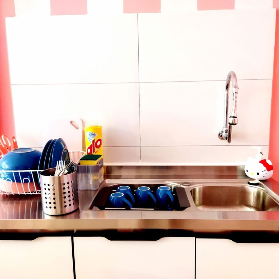 Fridge, microwave, electric kettle, cookware/dishes/utensils