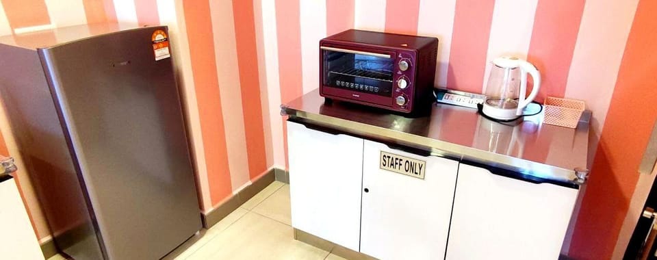 Fridge, microwave, electric kettle, cookware/dishes/utensils