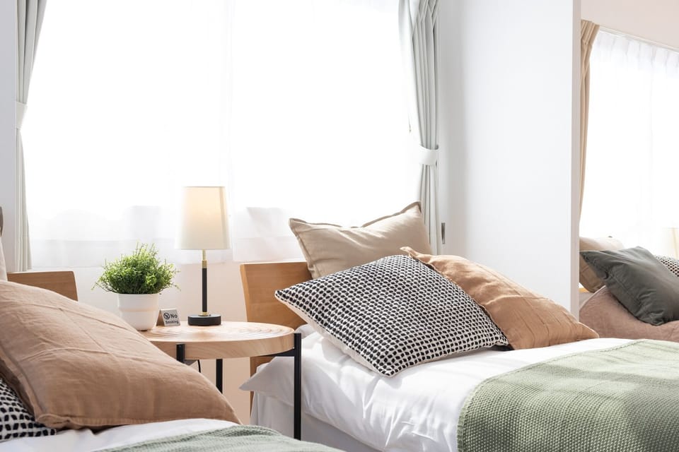 3F Bedroom D 2 single beds bedside