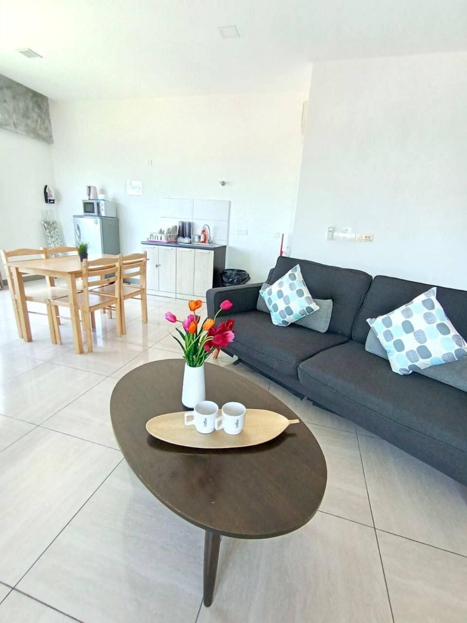 Apartment | Living area | 27-inch Smart TV with satellite channels