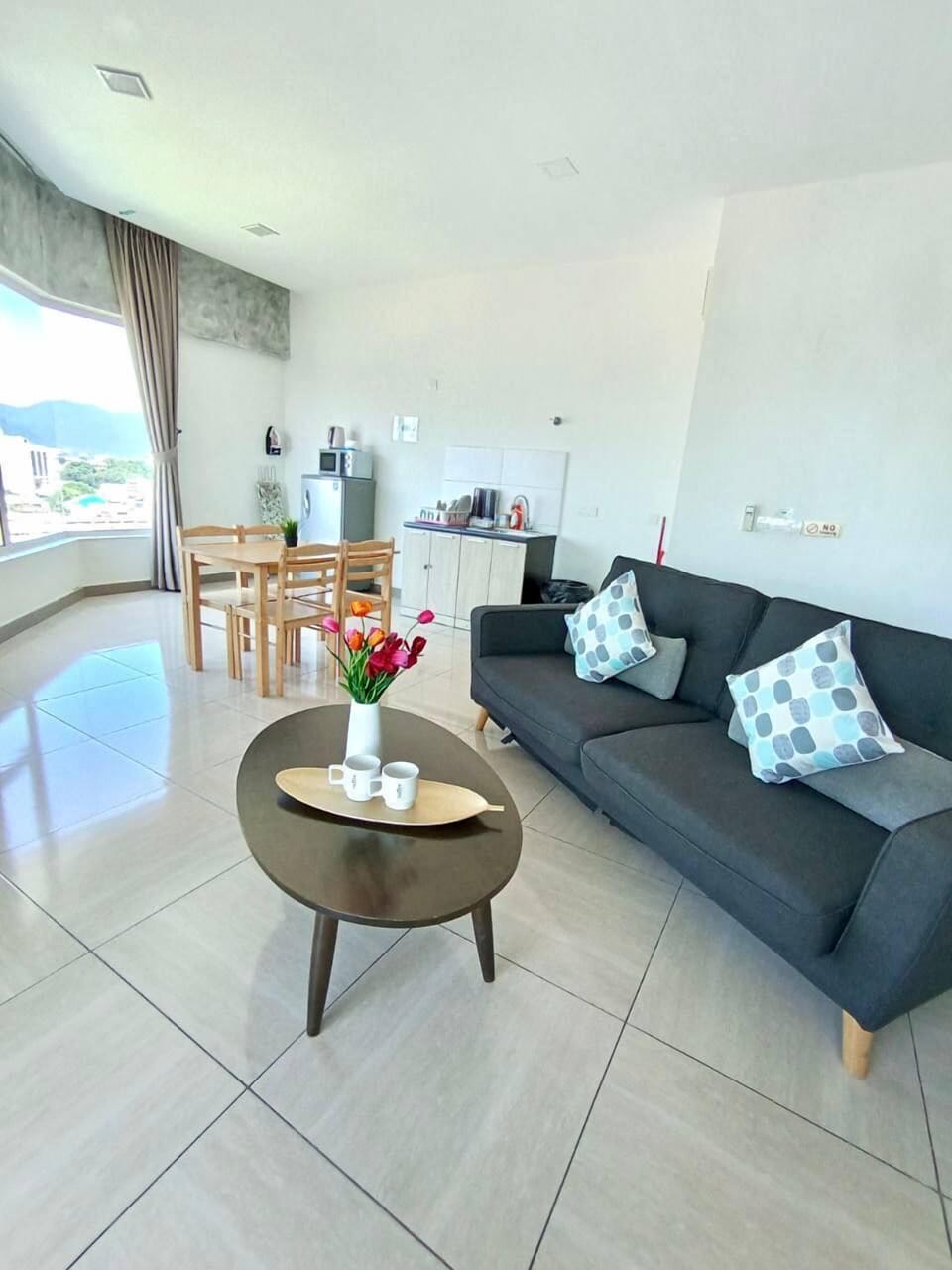 Apartment | Living area | 27-inch Smart TV with satellite channels