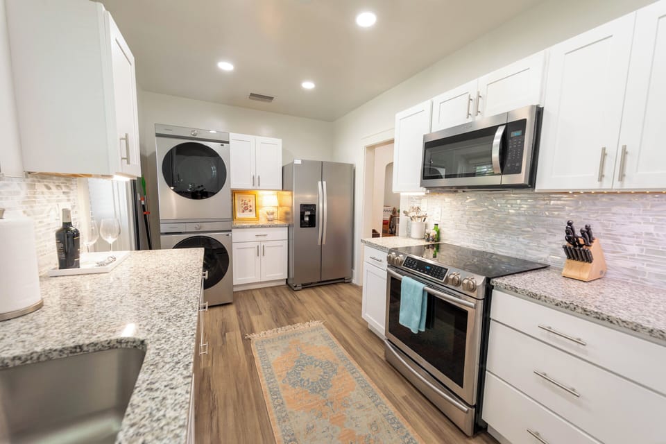 Kitchen - Enjoy Modern Convenience with a State-of-the-Art  Washer and Dryer,  Double Door Fridge With Filtered Water and Ice Maker