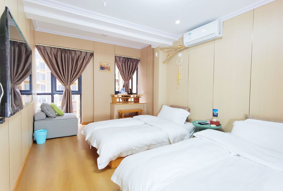Down comforters, laptop workspace, WiFi (free), bed sheets