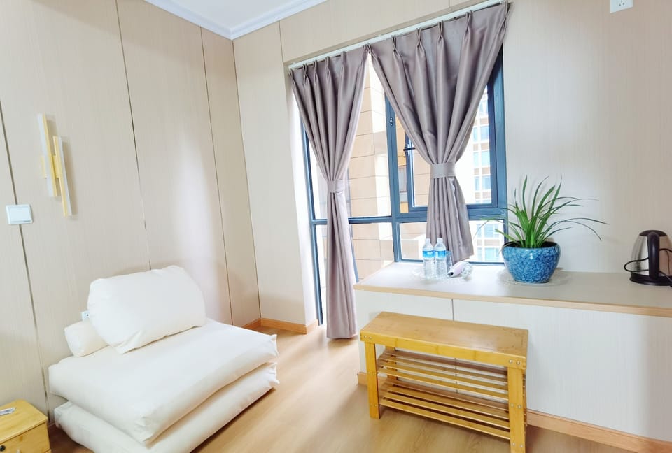 Down comforters, laptop workspace, WiFi (free), bed sheets