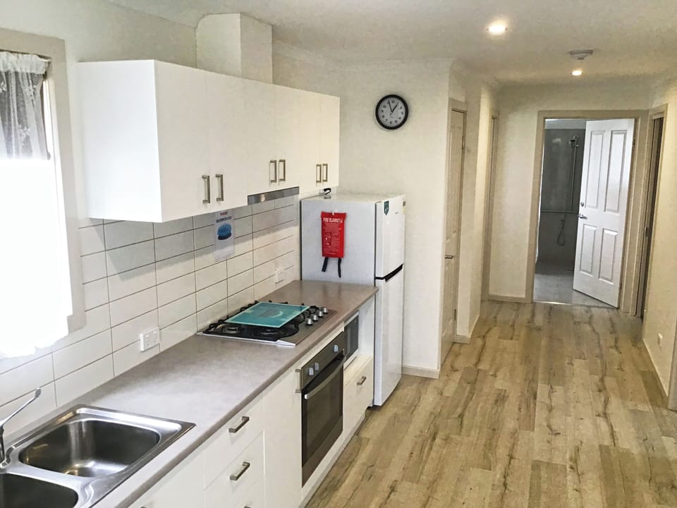 Superior Accessible 3 Bedroom Cabin | Private kitchen | Full-size fridge, microwave, oven, stovetop