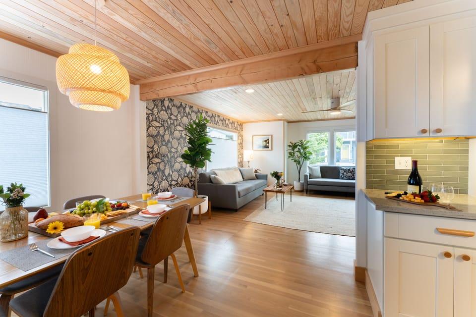 Living room opens to the dining area and kitchen.