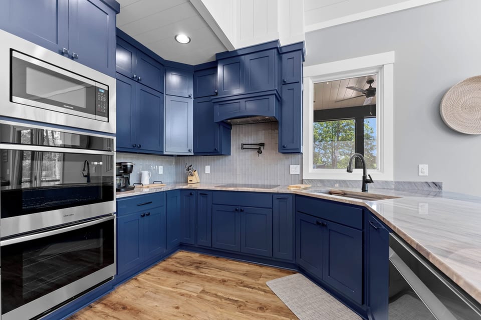 Blue Heron-fully stocked kitchen with island.