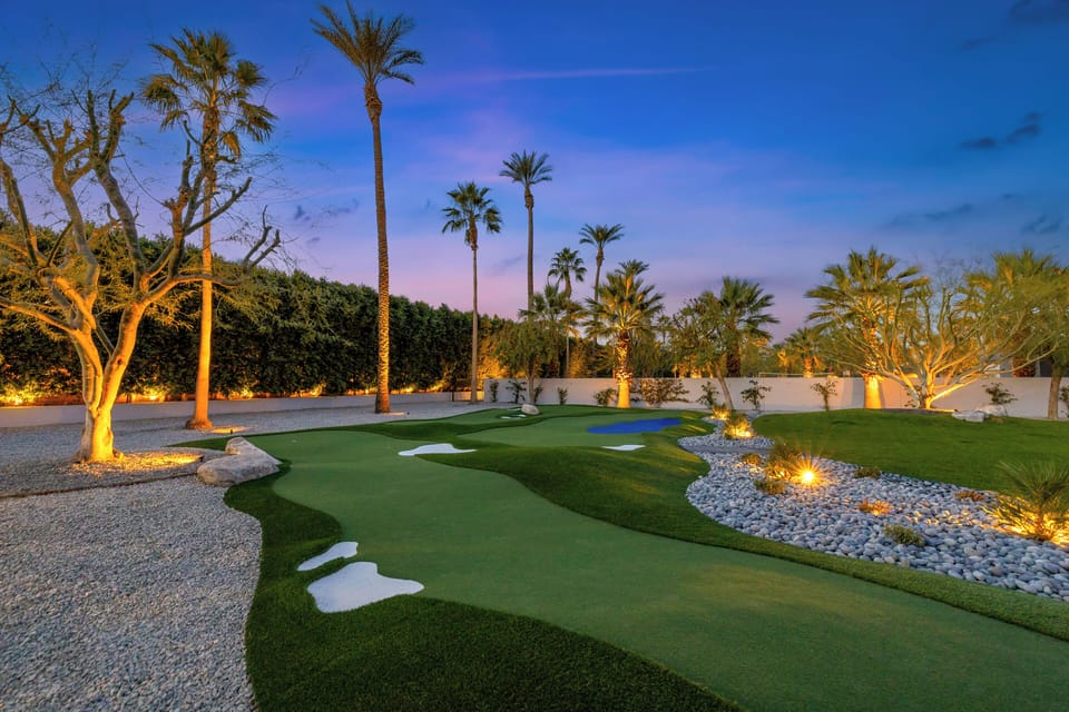 Private putting green to perfect your swing.