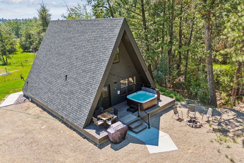 hot tub and back deck w/ grill, fire pit, outdoor dining