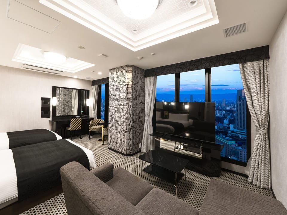 Executive Twin Room | Down comforters, desk, laptop workspace, blackout drapes