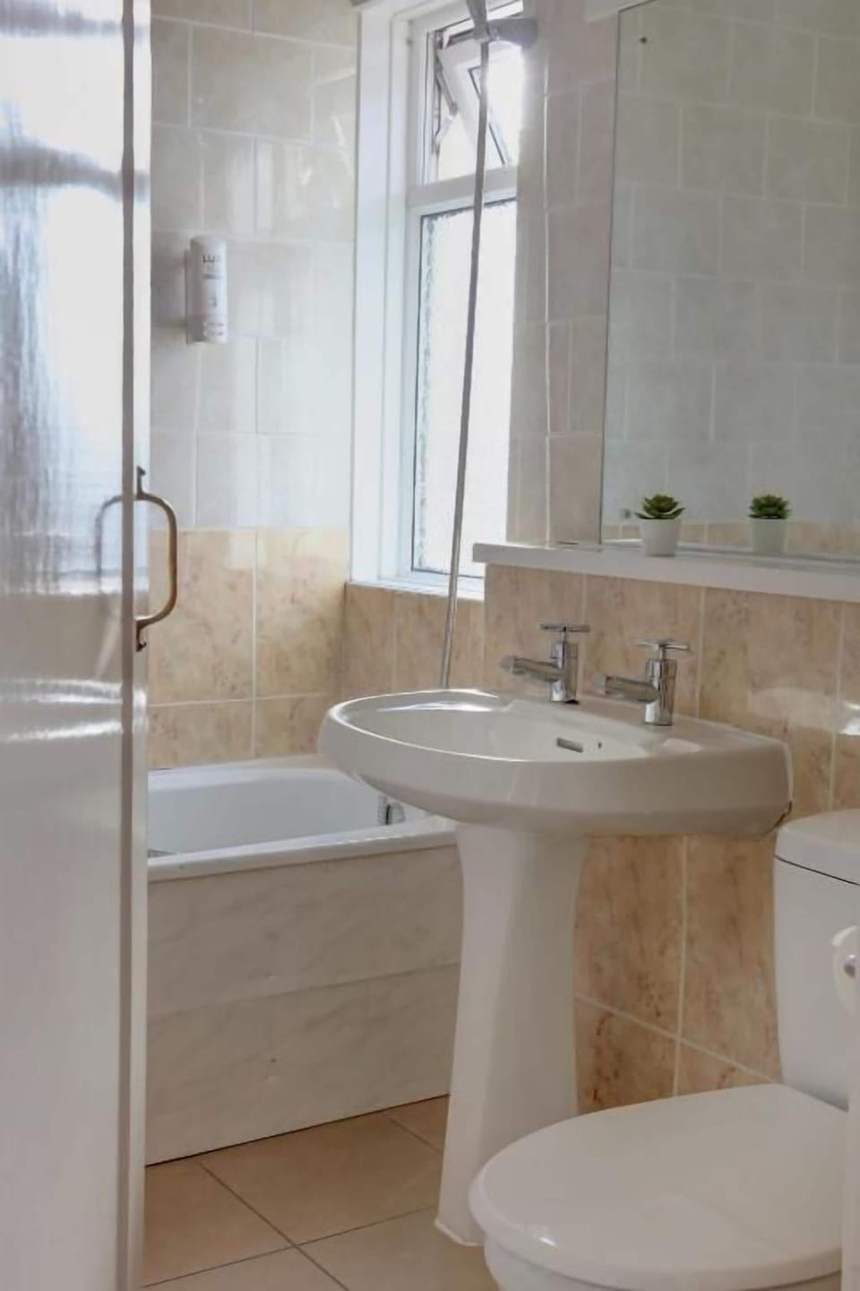 Shower, free toiletries, towels, toilet paper