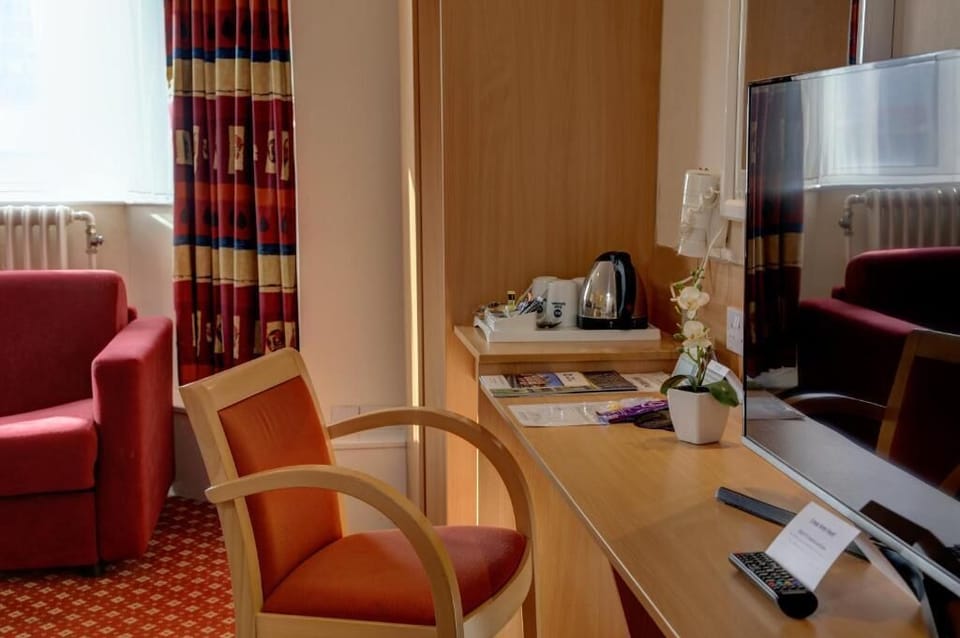 Standard Family Room for 4 | Iron/ironing board (on request), cribs (free), WiFi (free), bed sheets