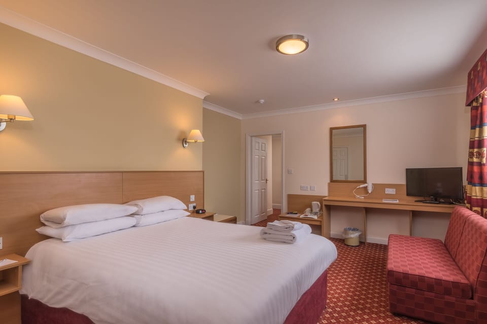 Standard Double Room | Iron/ironing board, free cribs/infant beds, free WiFi, bed sheets