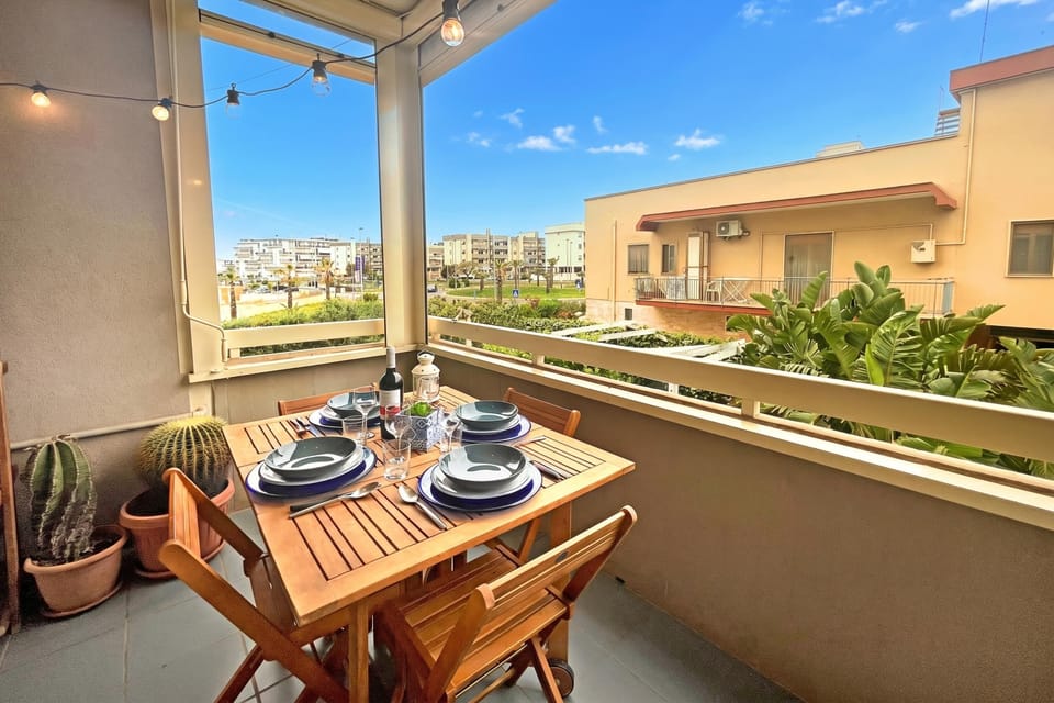 Family Apartment, Multiple Bedrooms, Refrigerator & Microwave (Monopoli Beach House 200 m from the) | Outdoor dining