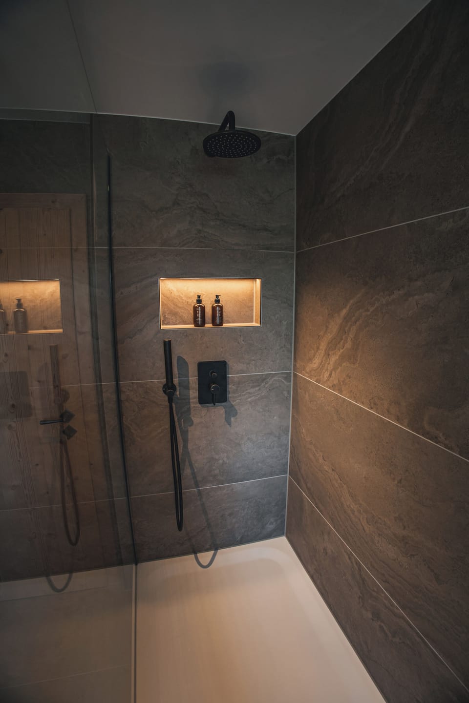Shower, rainfall showerhead, hair dryer, towels