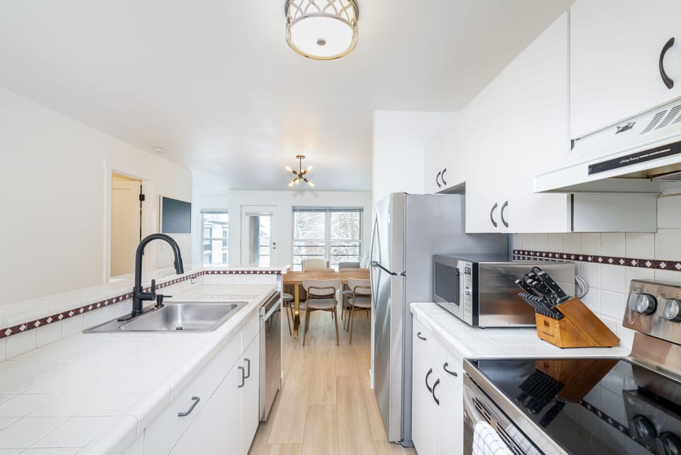 Kitchen - Fully appointed with stainless steel appliances