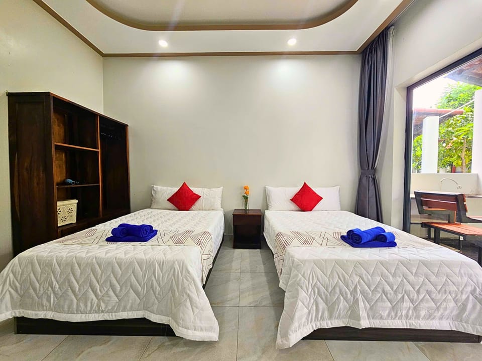 Deluxe Double Room, 2 Double Beds | Desk, laptop workspace, soundproofing, free WiFi
