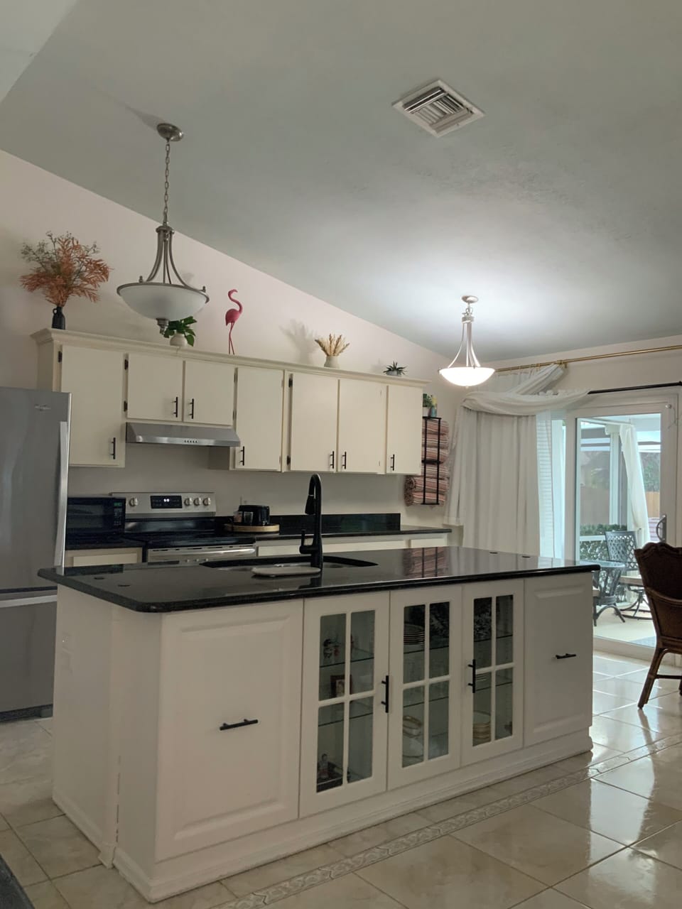 Perfect vacation kitchen. This space open to living space pool towels provided. 